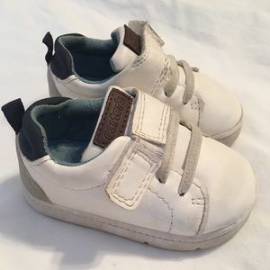 Carter’s white sneakers